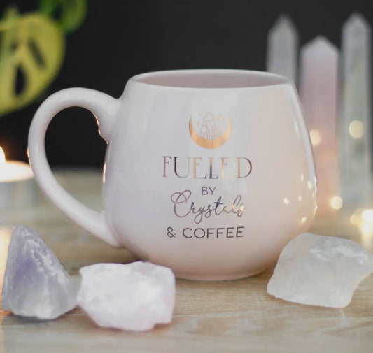 Crystals and Coffee mug promoting positive energy