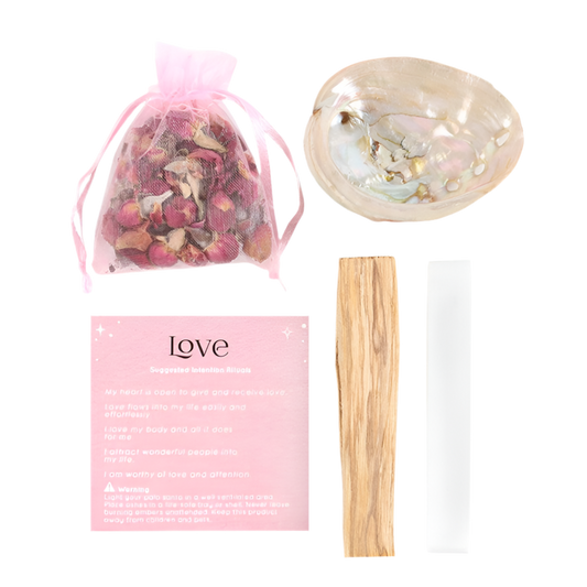 Spell kit with rose quartz, white sage, rose petals, abalone shell